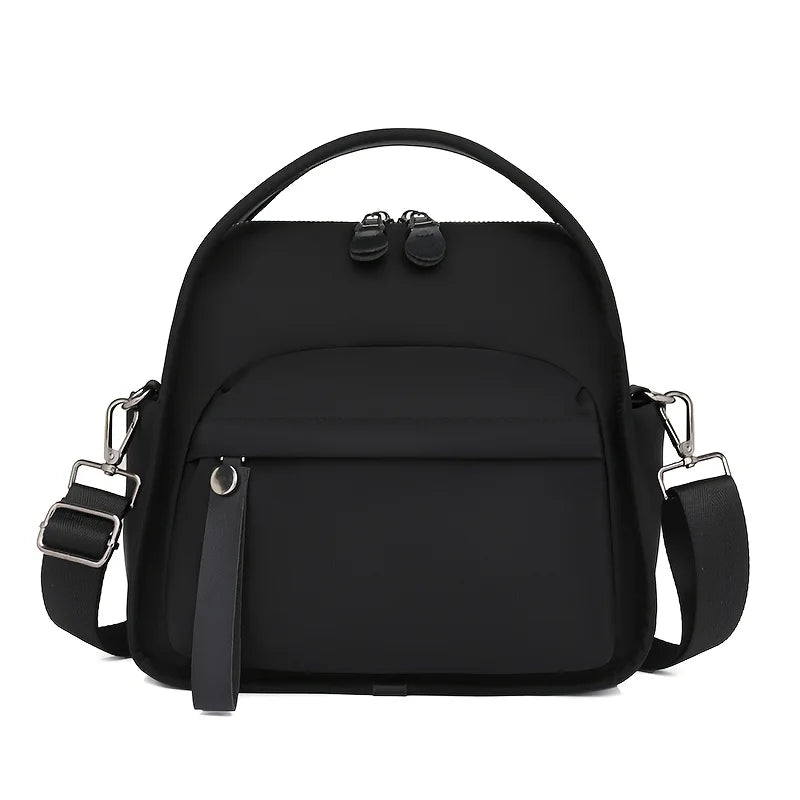 Black chic multi-pocket shoulder crossbody bag with adjustable strap and hardware