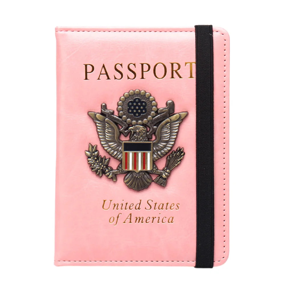 A pink leather passport holder featuring an embossed United States eagle badge.