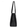 Black leather shoulder bag with a long strap shown from the side.