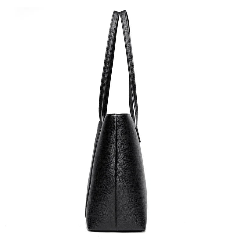 Black leather shoulder bag with a long strap shown from the side.