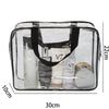 A clear PVC travel toiletry bag set containing three bottles of liquid products and a circular item.