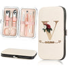 A beige cosmetic case holding a stainless steel nail clipper set and a large phone case with a personalized initial design