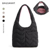 Black quilted nylon shoulder bag with pink lining and multi-pocket design