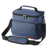 A dark blue insulated thermal lunch bag with black straps and silver zippers.