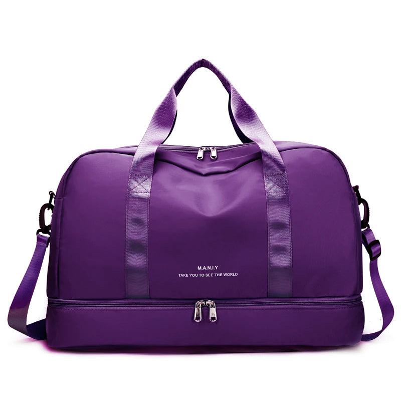 A purple expandable nylon travel duffle bag with black straps and a silver zipper.