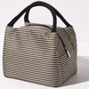 A striped insulated lunch tote bag with a black strap is shown against a white background.