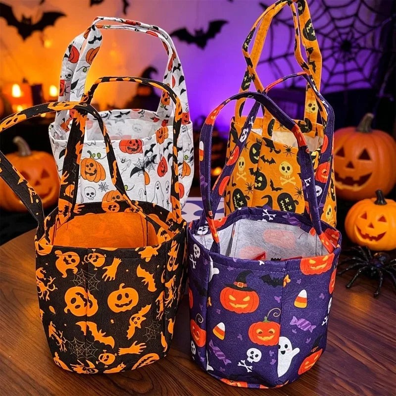 A set of Halloween non-woven tote bags featuring orange, black, and purple fabric with ghost, bat, and skull designs.