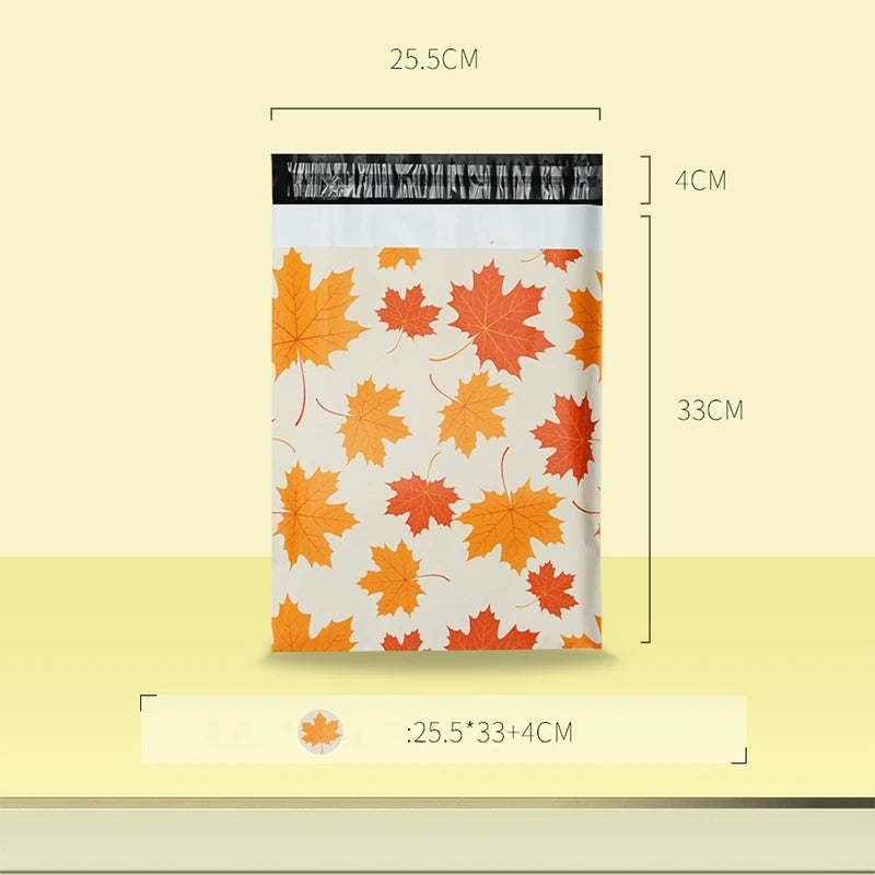 Sac d'envoi auto-scellable avec motif feuille orange et blanche, dimensions 25,5x33 cm et scellage de 4 cm.