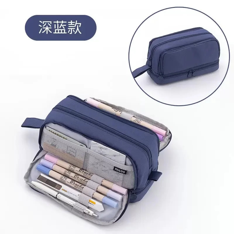 A dark blue pencil case with a zippered compartment showing various pens and pencils inside.