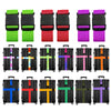 A collection of black and colored adjustable luggage straps for suitcases.