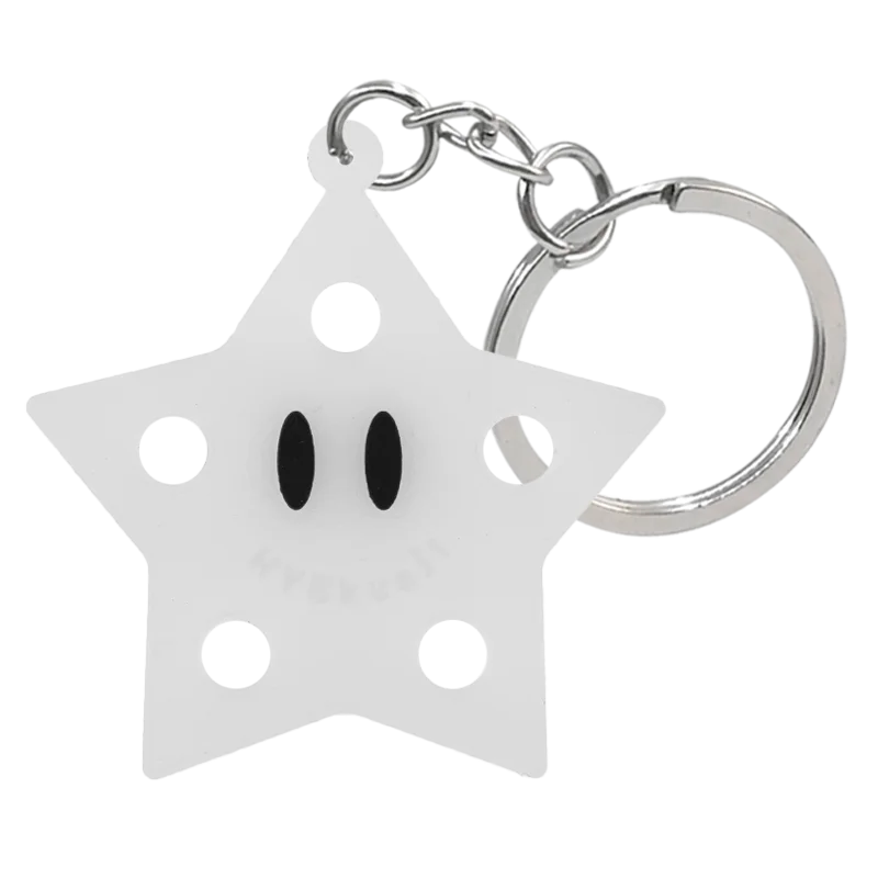 Porte-clés de chaussure en silicone en forme d'étoile blanche avec anneau à cliquet argenté.