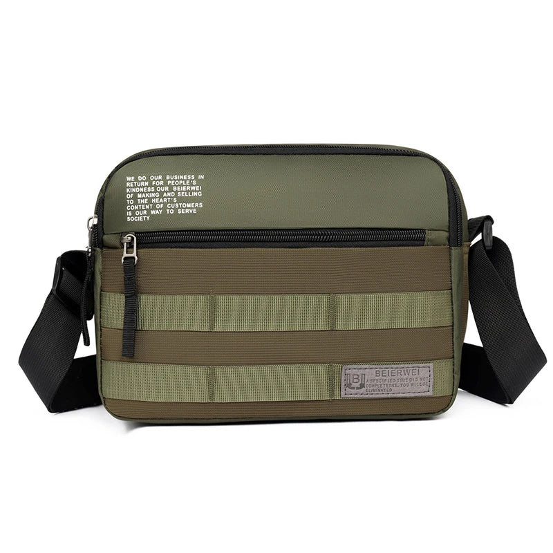 Olive green nylon shoulder bag with black straps and a beige fabric background