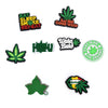 A collection of decorative shoe charms and pins featuring cannabis leaf designs and text like Eat Sleep Smoke Repeat and Bad 