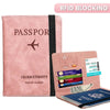 A pink passport wallet with a black strap and an RFID blocking feature, showing a passport and cash.