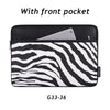 Black and white zebra print laptop sleeve with a front pocket