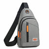 A gray lightweight oxford cloth crossbody bag with black strap and orange accents.