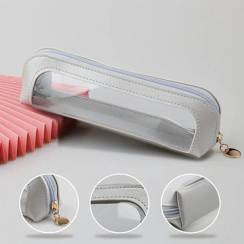 A silver cosmetic organizer pouch with a clear window and zipper, shown in various angles.