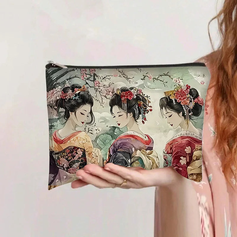 Bolsa de almacenamiento cosmético con estampado de tres mujeres en atuendos tradicionales y accesorios florales para el cabel