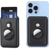 A black MagSafe card wallet with a built-in pocket for an AirTag, shown next to a light blue iPhone.