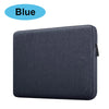 A dark blue waterproof canvas laptop sleeve with a soft fleece lining.