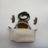 A beige waterproof nylon crossbody bag with a detachable mini pouch and black strap displayed on a white background.