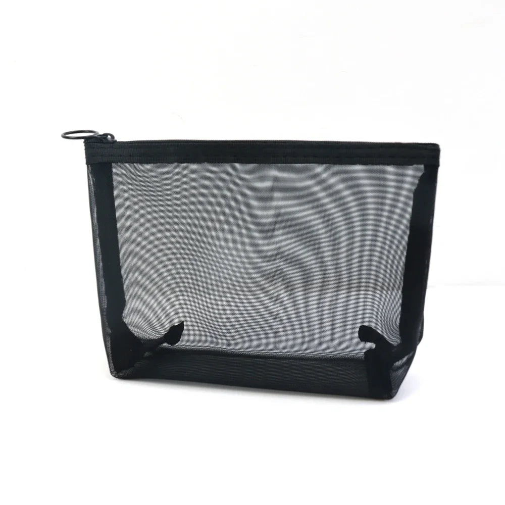 Black mesh travel cosmetic storage pouch with a zipper on a white background.