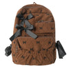 Brown corduroy backpack with a black bow print detail