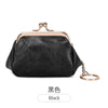 Black leather coin purse with a gold-toned clasp and keychain.