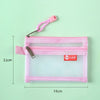 A pink double-layer zipper pouch with a clear window and a pink strap, shown against a light green background.