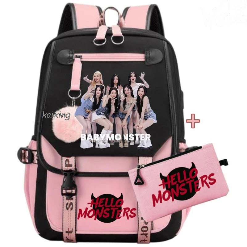 Pinkes und schwarzes Canvas-Rucksackset mit Hello Monsters Figuren für Schüler.