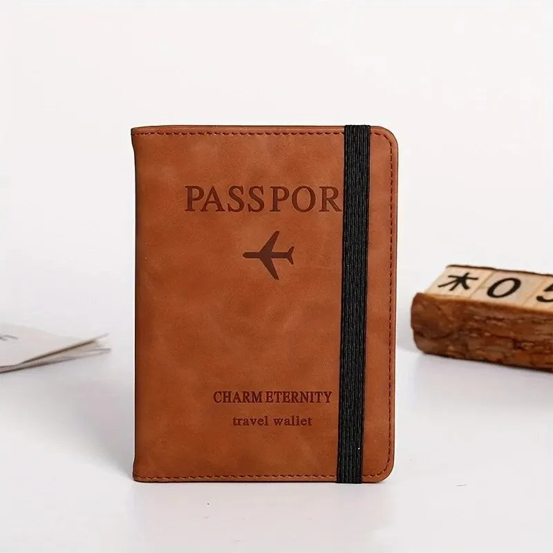 A brown leather passport wallet with black trim, featuring the word PASSSPORT and CHARM ETERNITY.