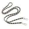 A silver and black metal chain shoulder strap for crossbody bags.