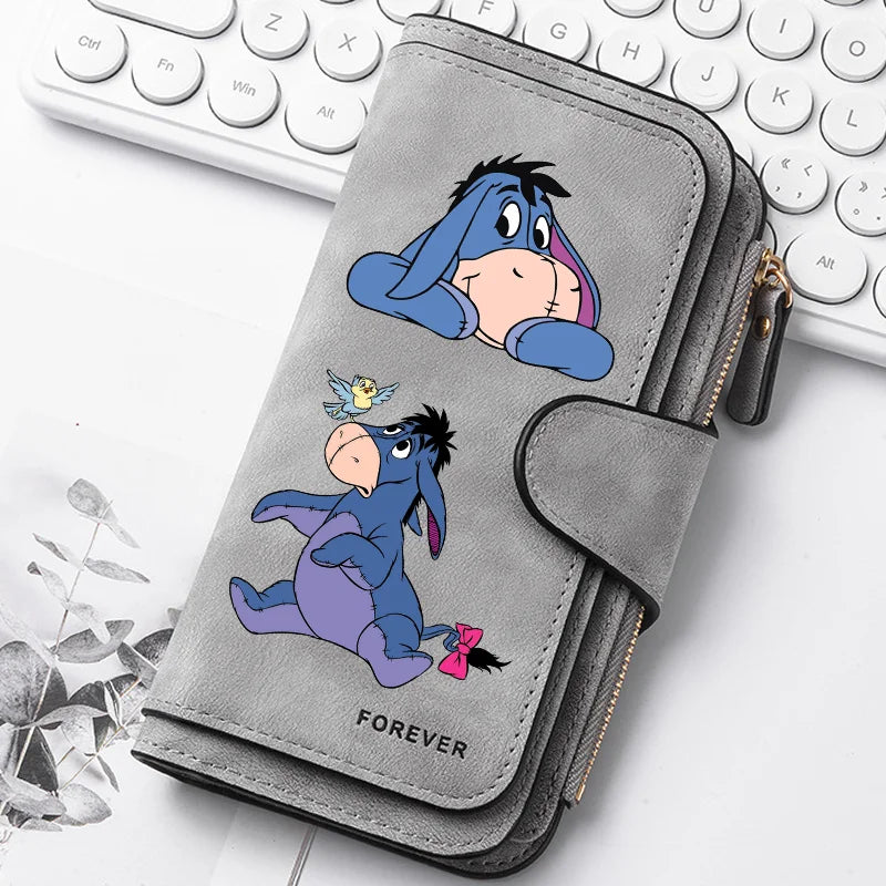 A gray zippered pouch featuring two cartoon blue ponies with the word forever printed on it.