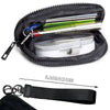 Black multi-functional zipper coin purse wallet with a clear plastic compartment and a metal key.