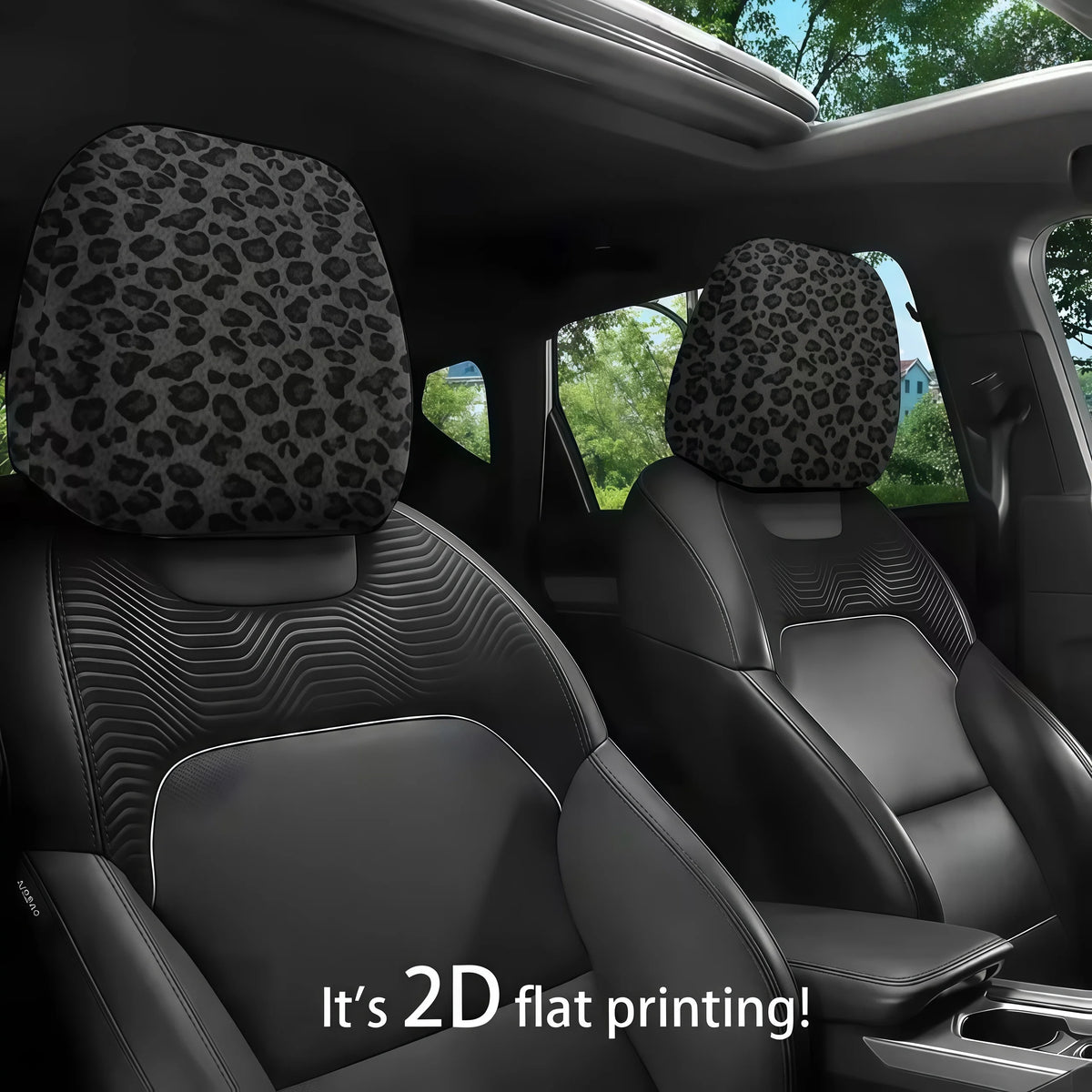Black car seats with leopard print headrest covers installed in a vehicle interior.