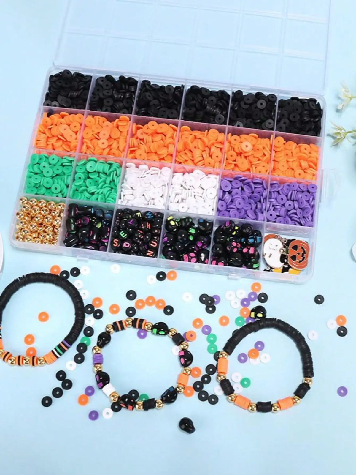 A collection of colorful polymer clay bracelets in various colors and textures displayed in a clear plastic tray.