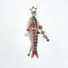 A silver simulation fish keychain featuring a red and white striped body and a star charm.