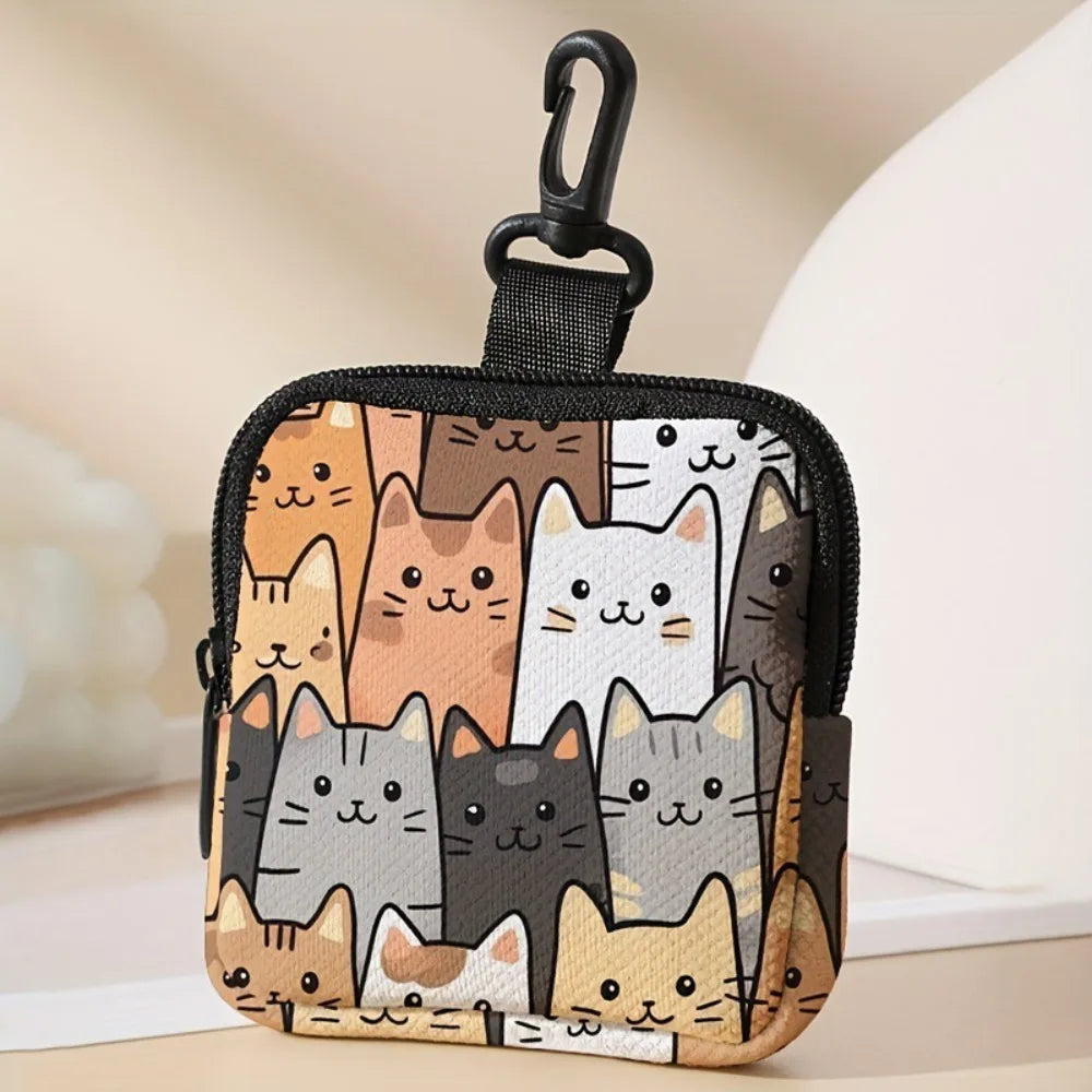A black zippered pouch featuring a collage of cute cat faces in various colors and styles.