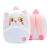 A white cartoon cat plush backpack with pink accents and ears.