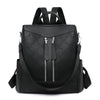 Black leather anti-theft women's backpack with padded straps and zippered compartments
