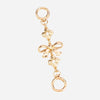 Gold metal purse chain strap with a decorative bow charm and a loop end