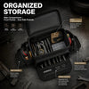 An open black tool bag showing various tools and pockets for organized storage.
