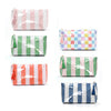 Four cosmetic storage pouches in various stripes and patterns of pink, green, red, and blue.
