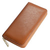 A brown genuine leather zipper wallet shown from above.