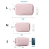 A set of three cosmetic toiletry bags in pink for large, medium, and small sizes shown with iPhone 13.