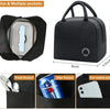 Black insulated canvas lunch bag showing various pocket configurations including front, side, and main compartments