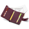 A maroon folding wallet with a gold accent holds cash and cards against a white background.