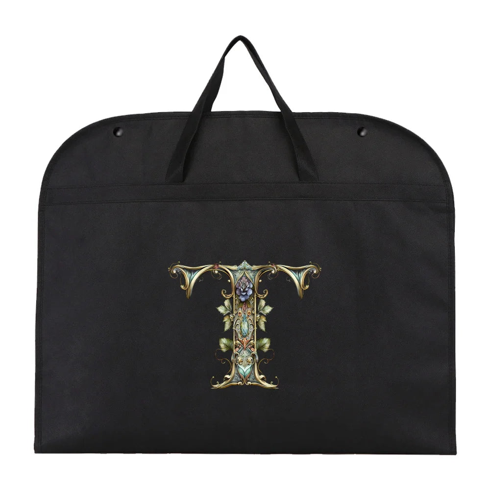 Black fabric dust cover and storage bag with an ornate gold and green design