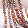 Strands of faceted crystal glass beads in various shades of amber and purple for jewelry making