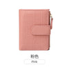 A pink quilted minimalist PU leather bi-fold wallet with an ID window.